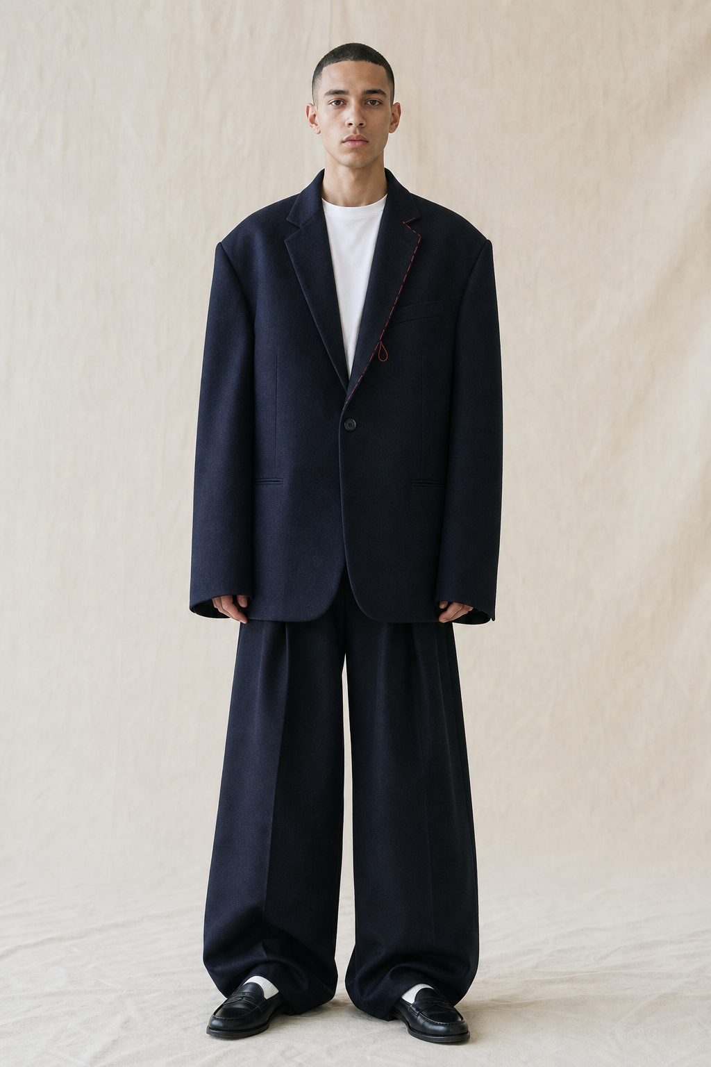 Look 01 — the re-cut Ludlow suit